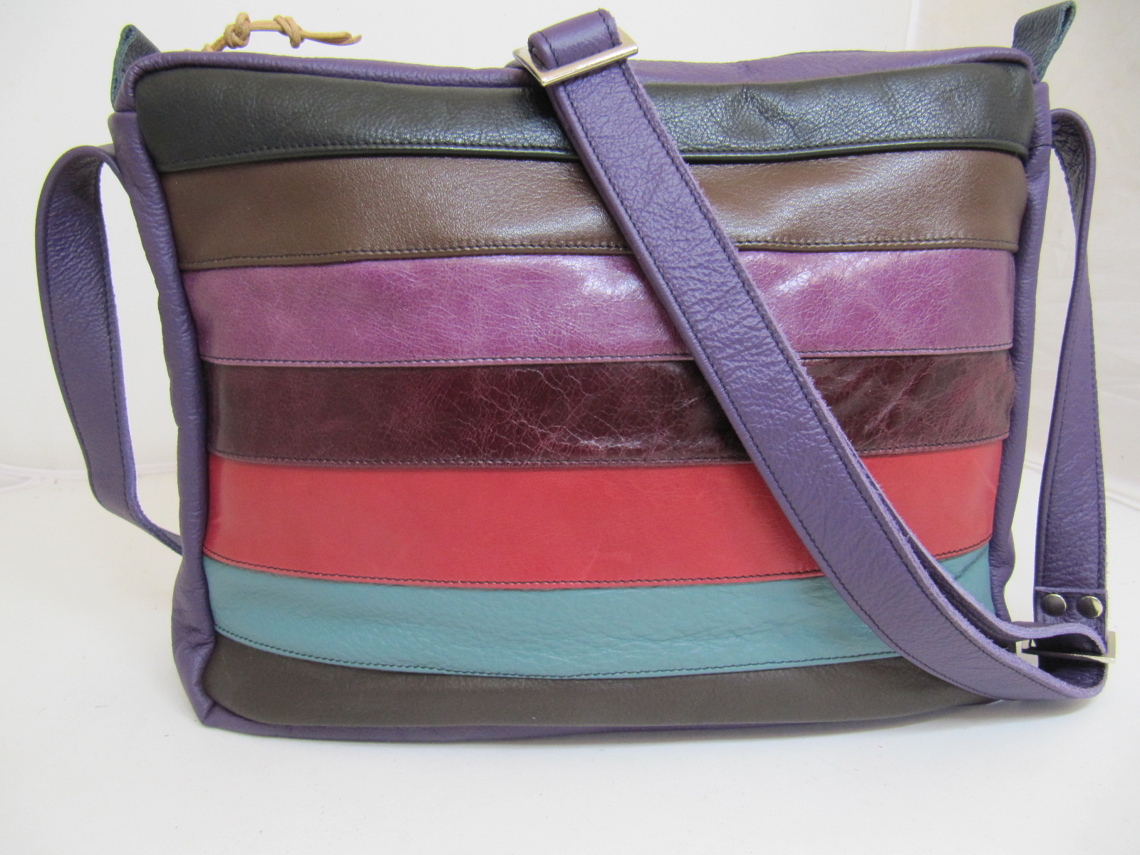 Leather stripe handbag in purples