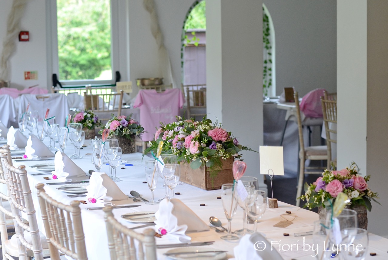 top-table-of rustic-wooden-boxes,pink,lilac+white-flowers-rustic-style.jpg
