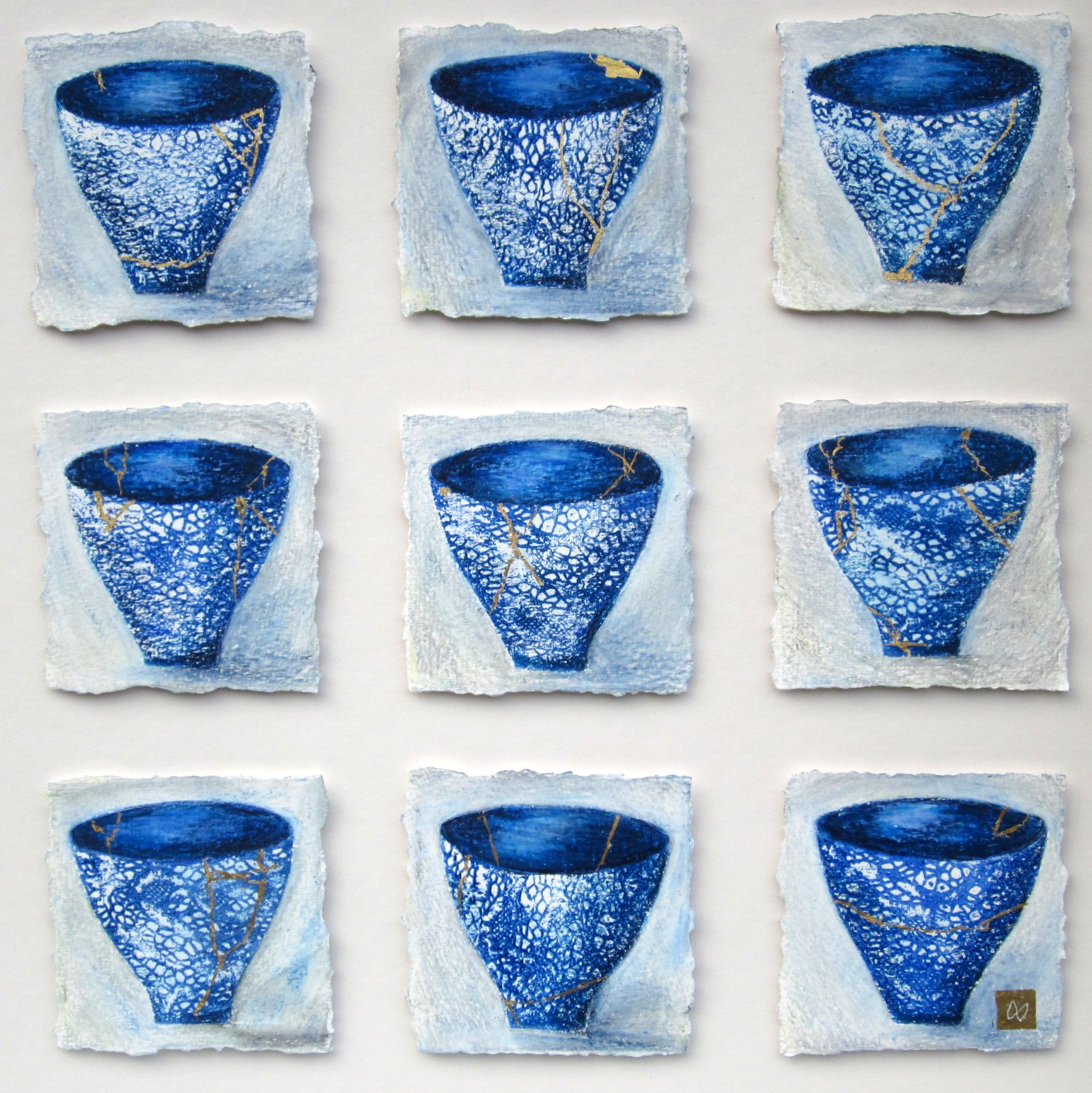 Nine blue lace kintsugi tea bowls with gold repair