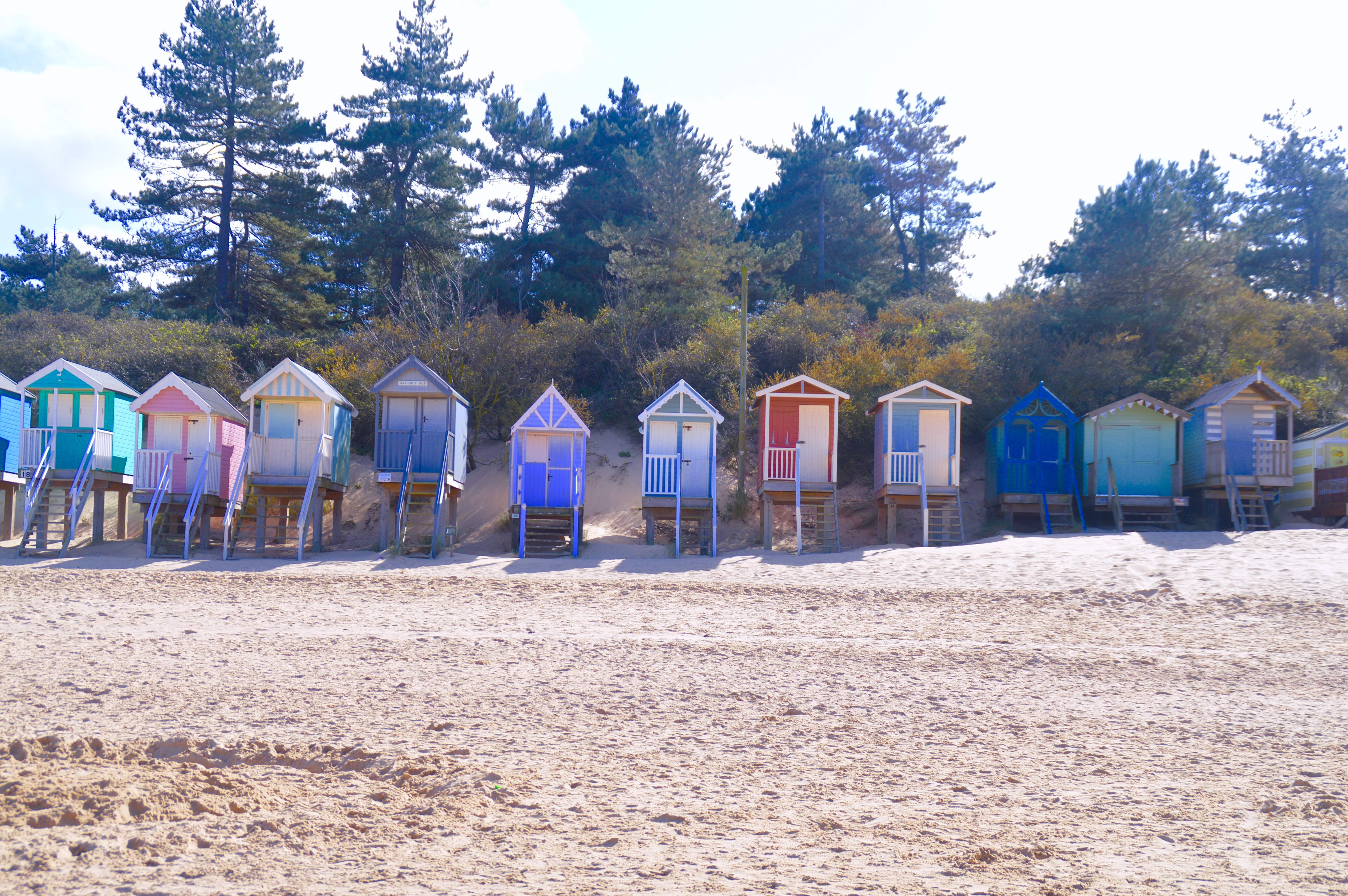 A selection of the attractively decorated beach huts on Holkham beach