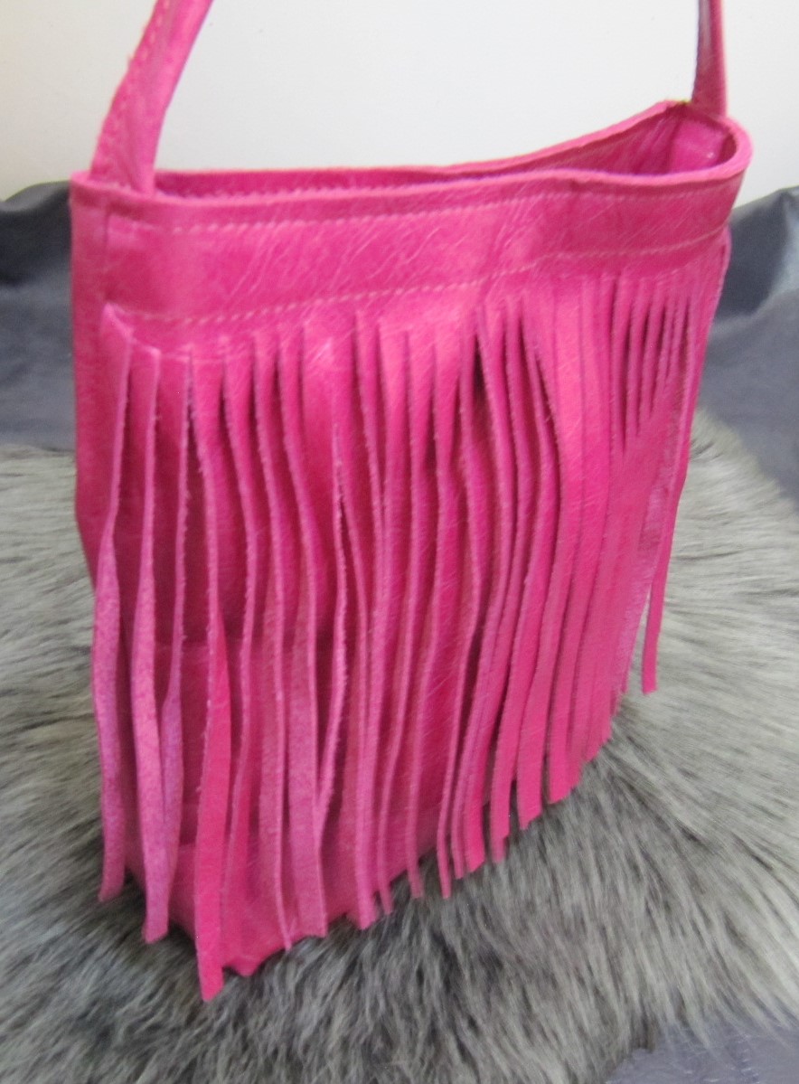 Small fringed pink leather bag