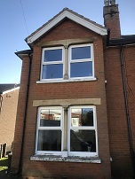 Replacement PVCu white top opening windows with horns