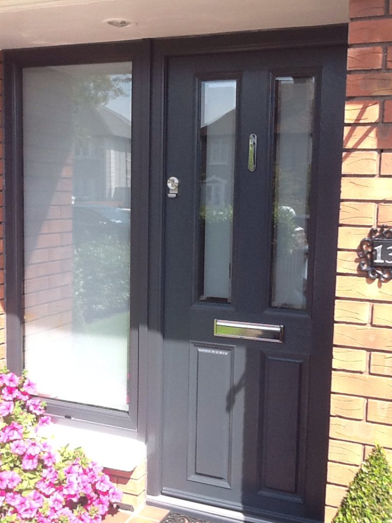 ANTHRACITE GREY APEER APM2 COMPOSITE FRONT DOOR FITTED BY ASGARD WINDOWS IN DUBLIN 12.