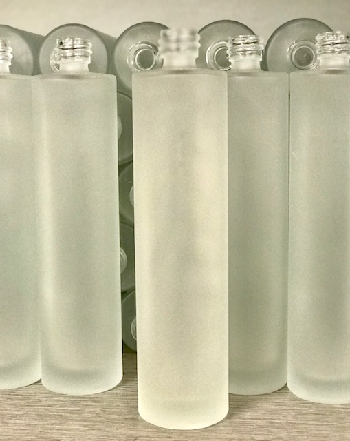 Acid etched glass bottles.jpg