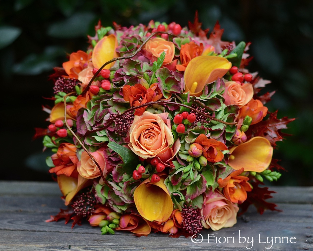 autumnal-bouquet,orange-rose,callaLily,berry,freesia,oak-leaves,twig.jpg