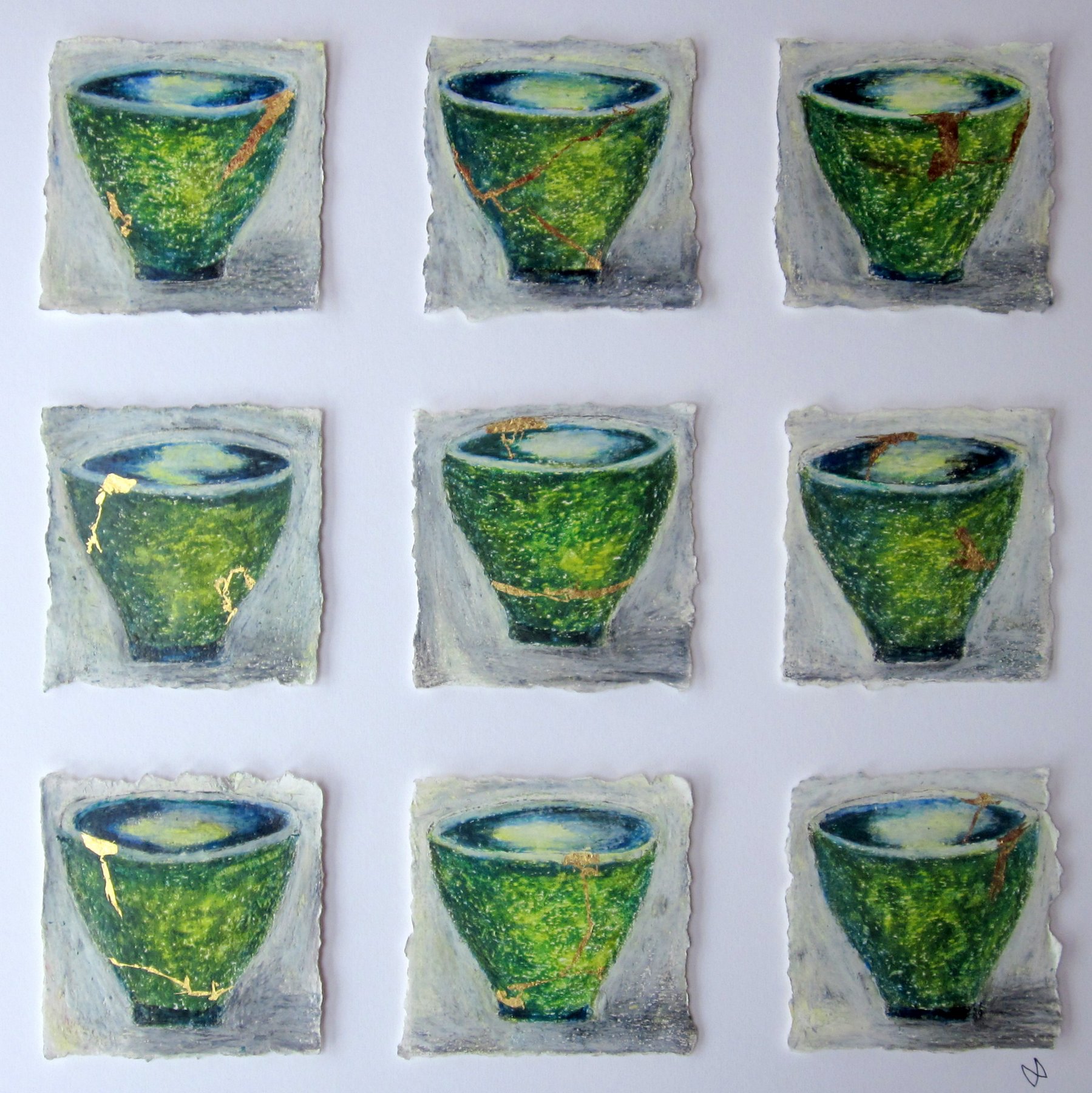 Nine green kintsugi tea bowls with gold repair