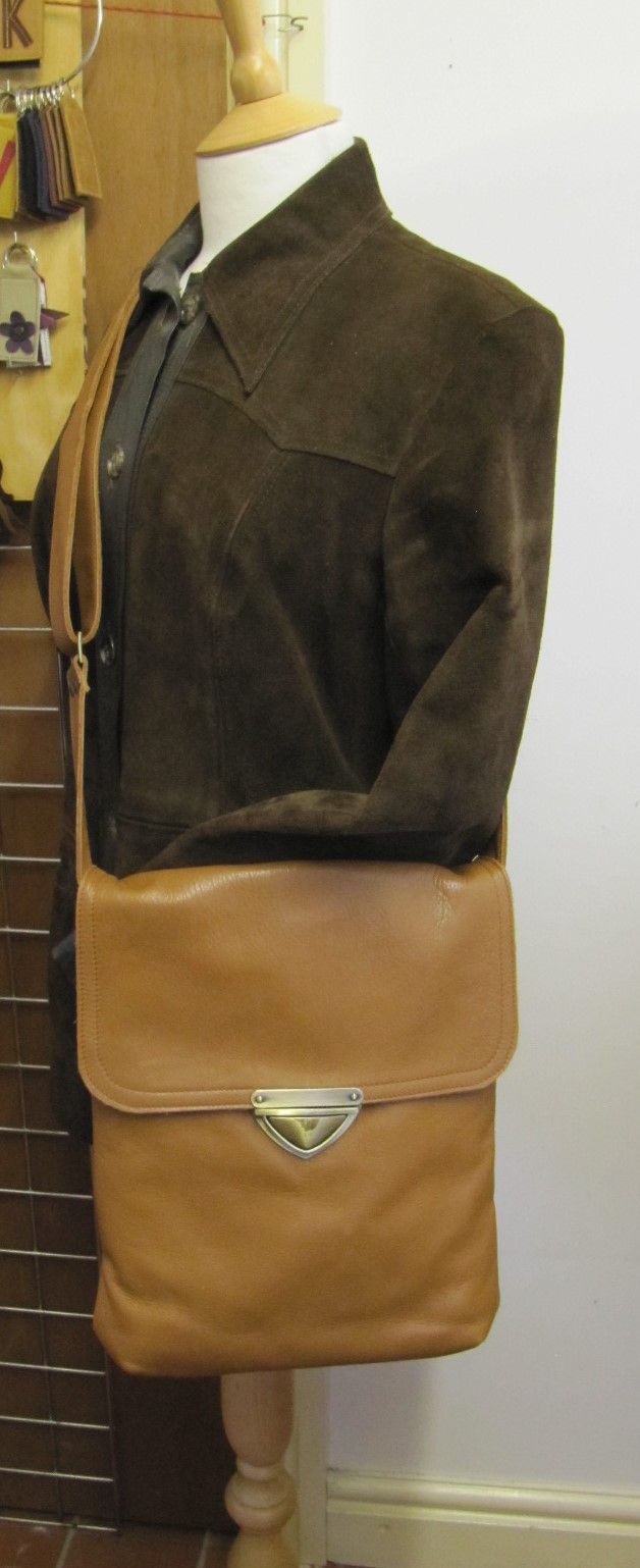 Tan leather messenger bag