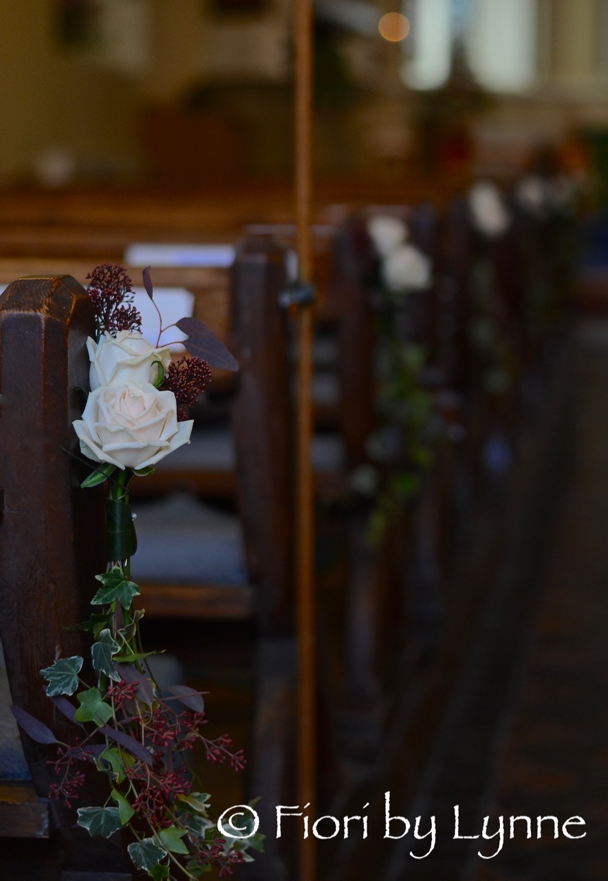 church-pew ends, rose,berry, ivy-trails,autumn-wedding.jpg