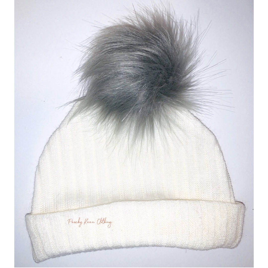 white bobble hat