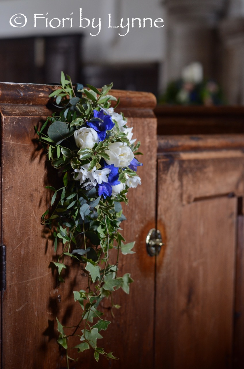 pewEnd,rustic-spring,tulips,delphinium,ivy-trails.jpg