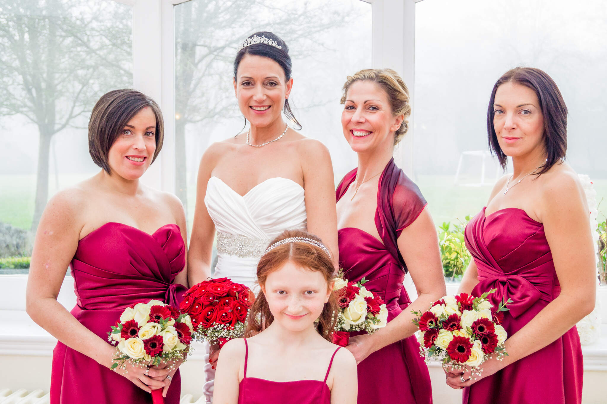 Hanbury Manor Wedding, Hertfordshire, bridesmaids, red bridesmaid dress portrait