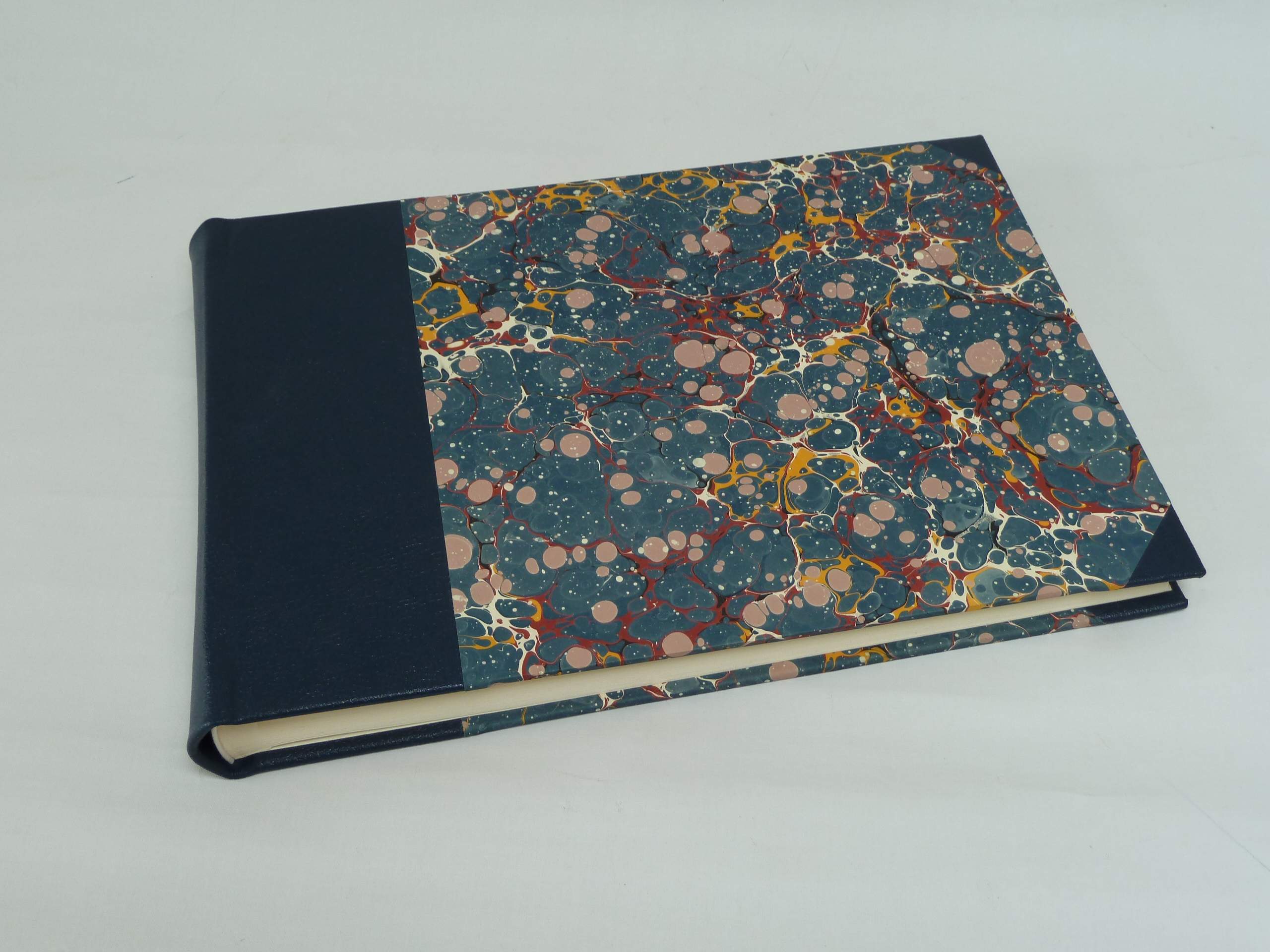 Bound in leather and marbled paper of your choice