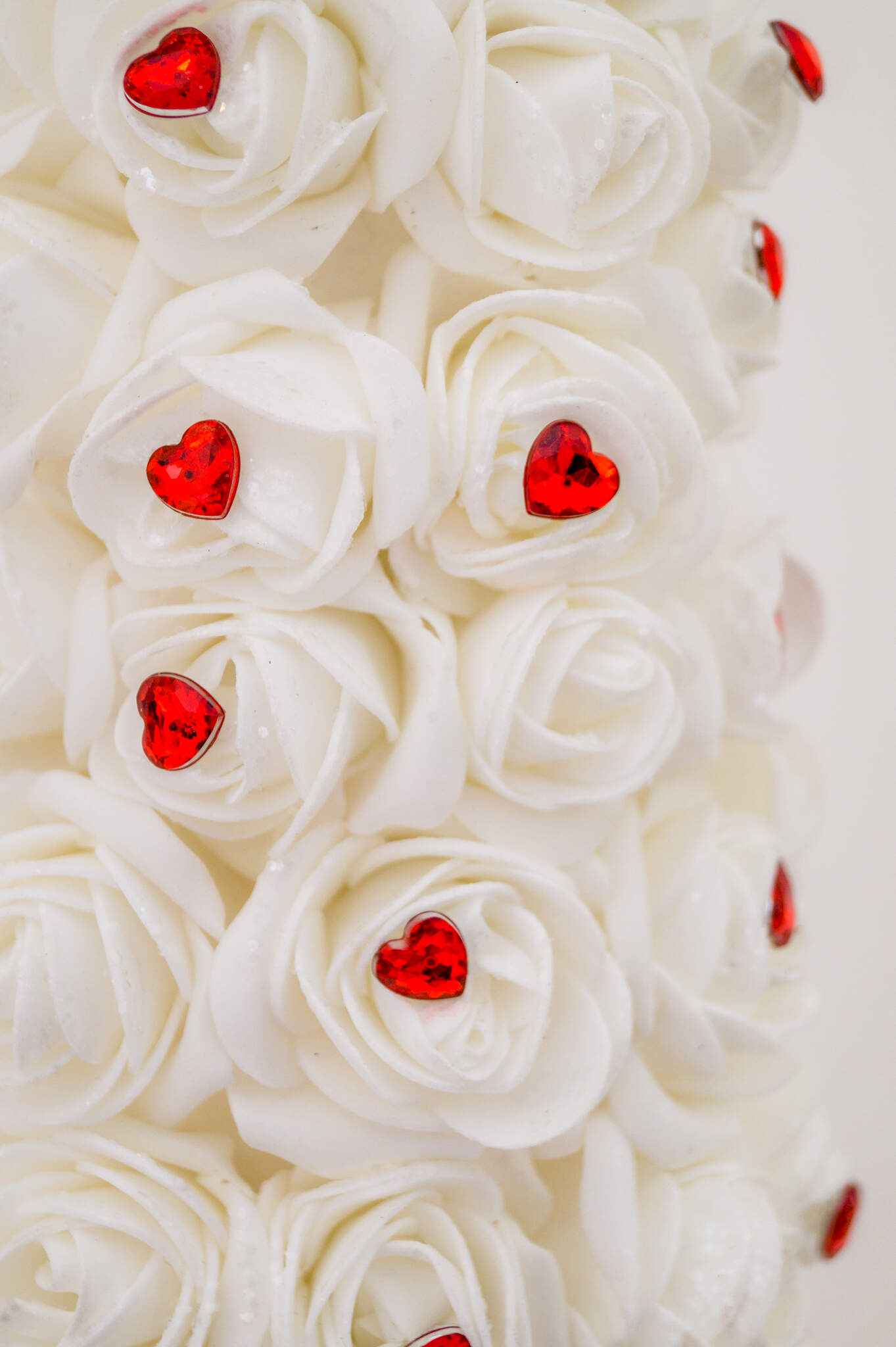 Hanbury Manor Wedding, Hertfordshire, white roses, red heart details, wedding decorations