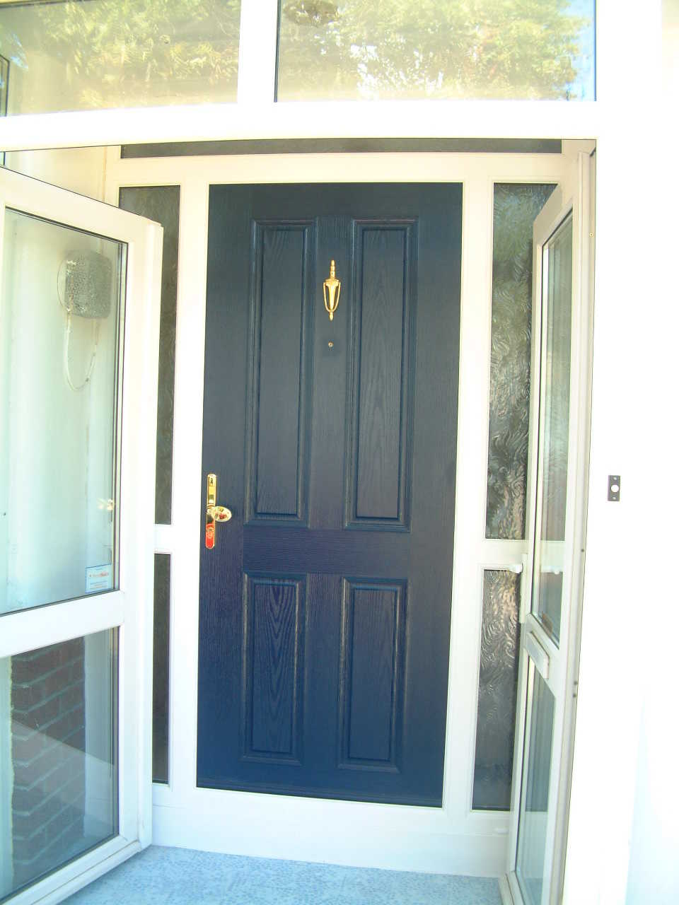 BLUE APEER APL1  DOOR WITH WHITE FRAME FITTED BY ASGARD WINDOWS IN DUBLIN.