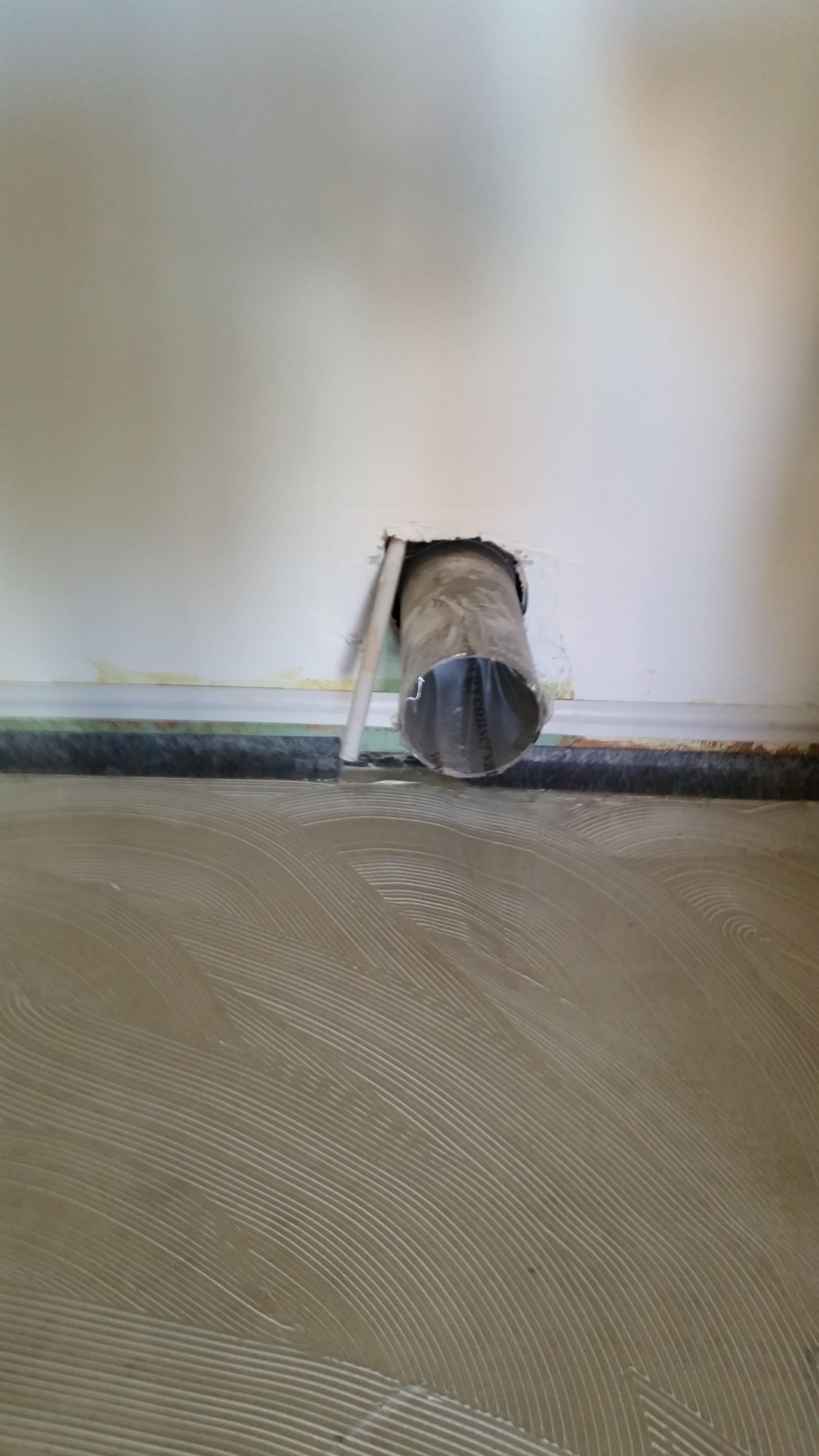 Fit skirting boards and seal to the floor with mastic for best results.