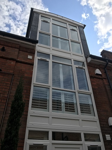 All white windows and panel fitted to office block