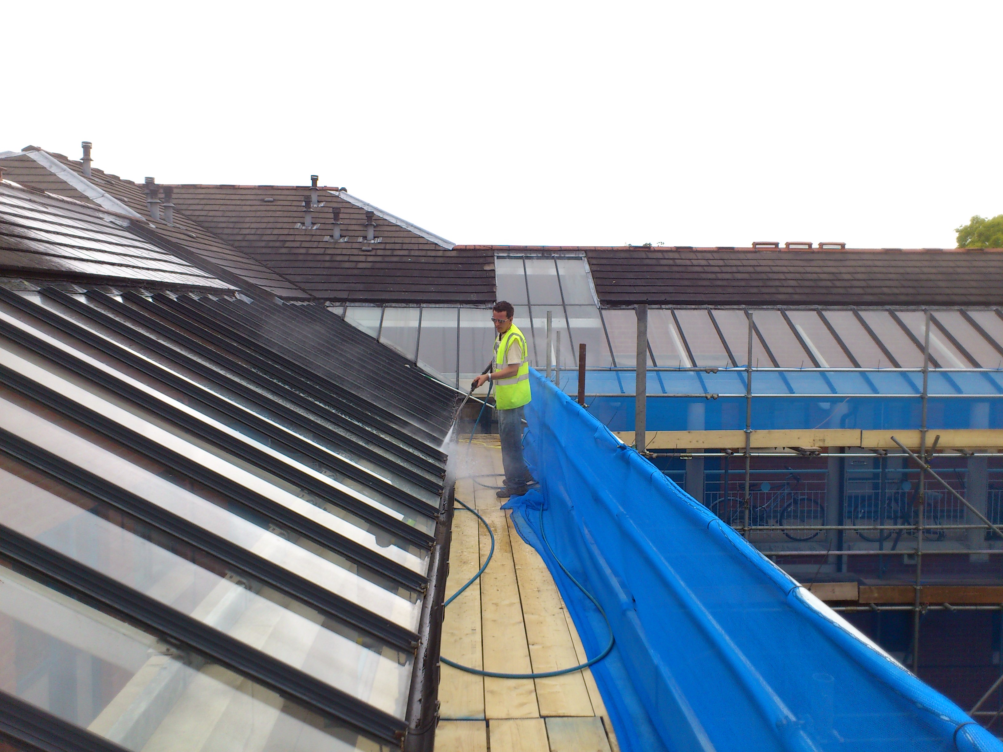 Steam cleaning / pressure washing of high level  glass roof in Cambridge.