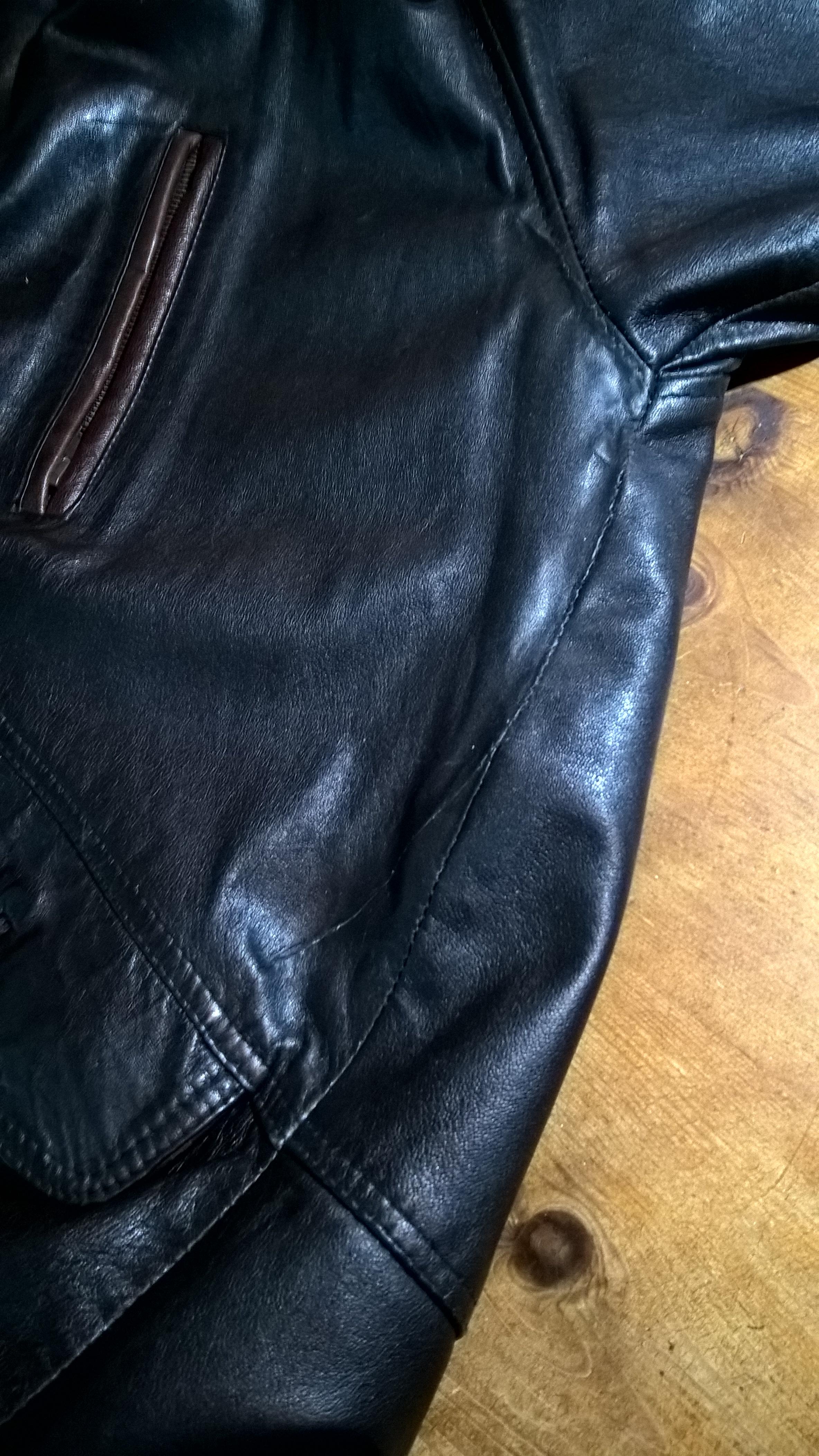 A tear repaired for this soft, lamb leather jacket