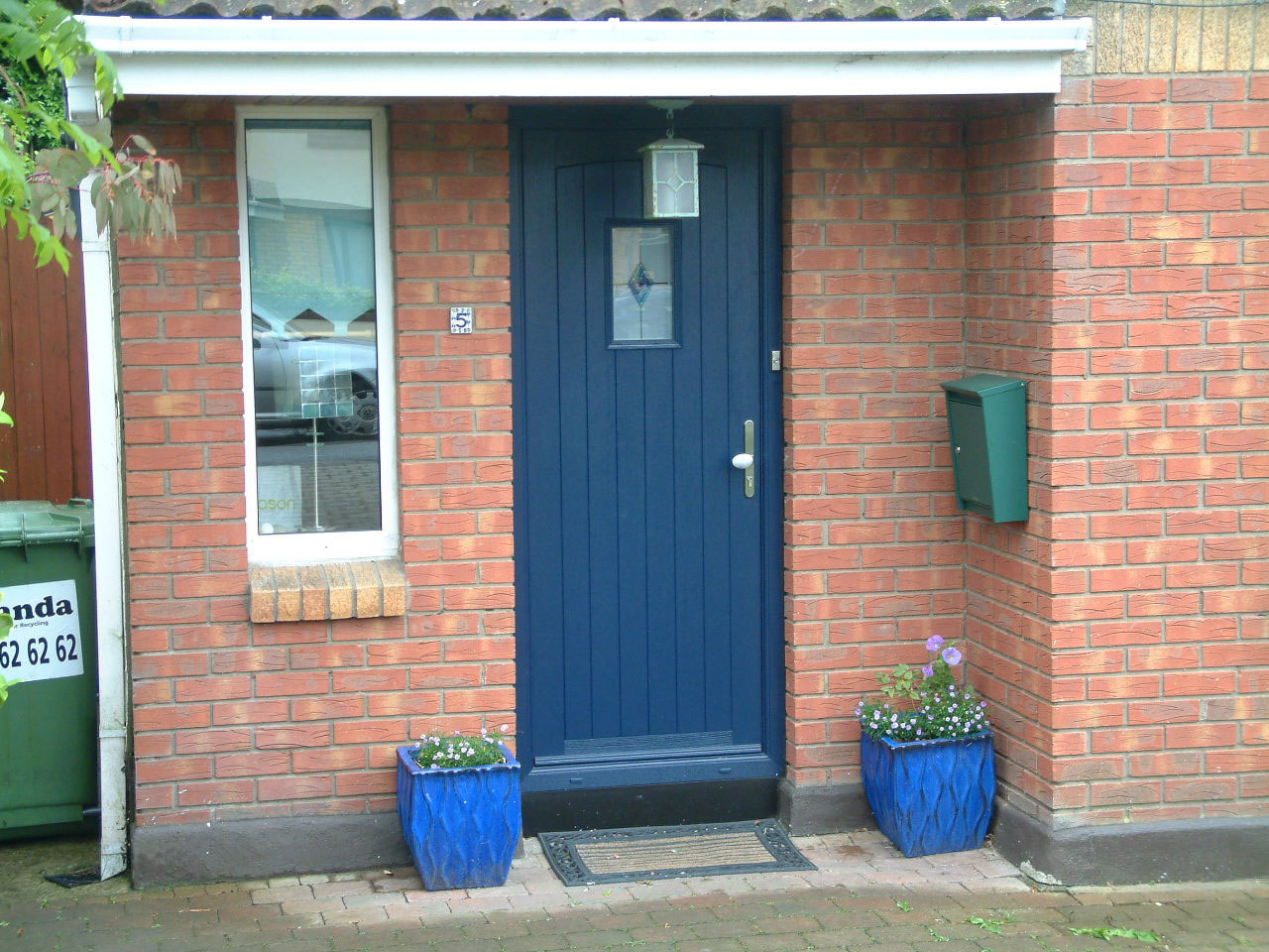 BLUE APEER APY2 COMPOSITE fRONT DOOR FITTED BY ASGARD WINDOWS IN DUBLIN.