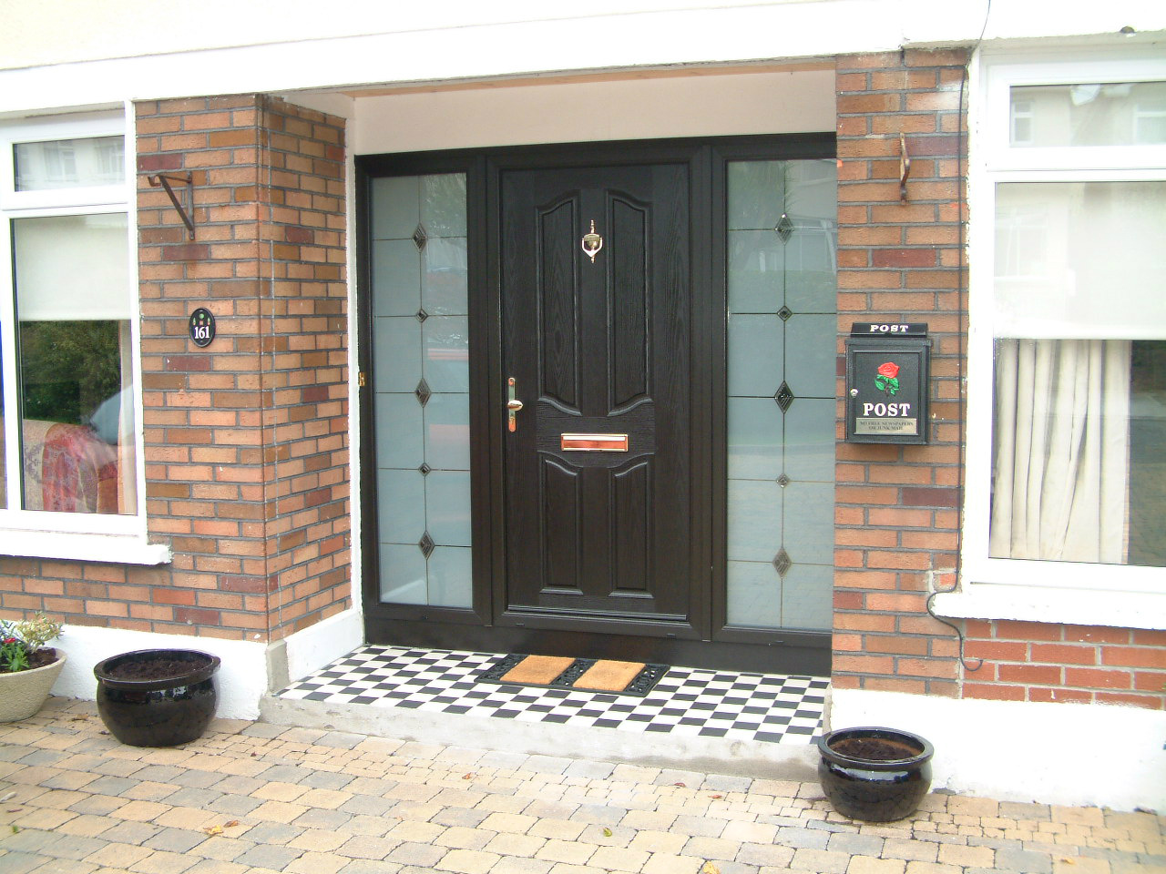 BLACK APEER APL1 COMPOSITE FRONT DOOR FITTED BY ASGARD WINDOWS IN DUBLIN.