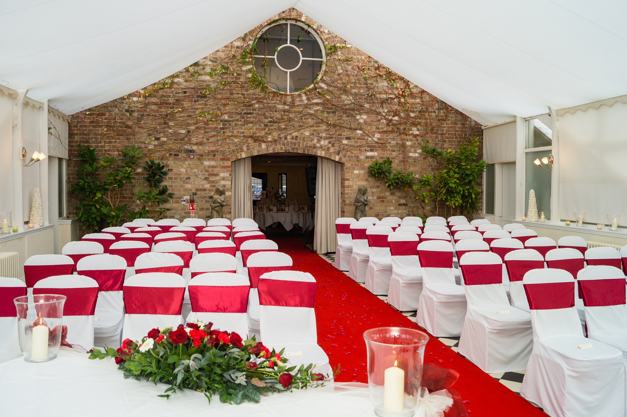 Hanbury Manor Wedding, Hertfordshire, ceremony details, red chair tie, winter wedding