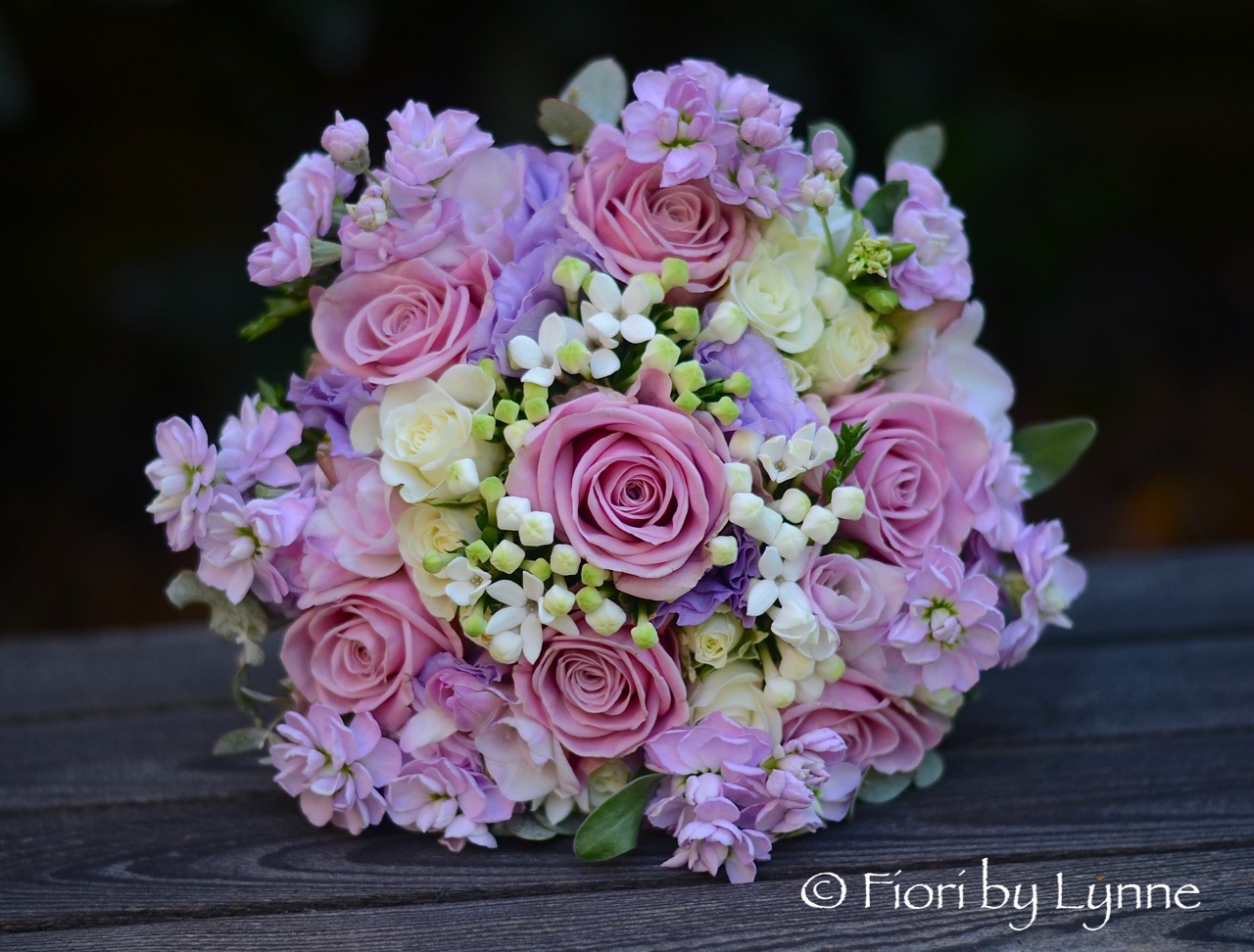pink-lilac-ivory bouquet of rose, freesia, lisianthus,bouvardia,stock.jpg