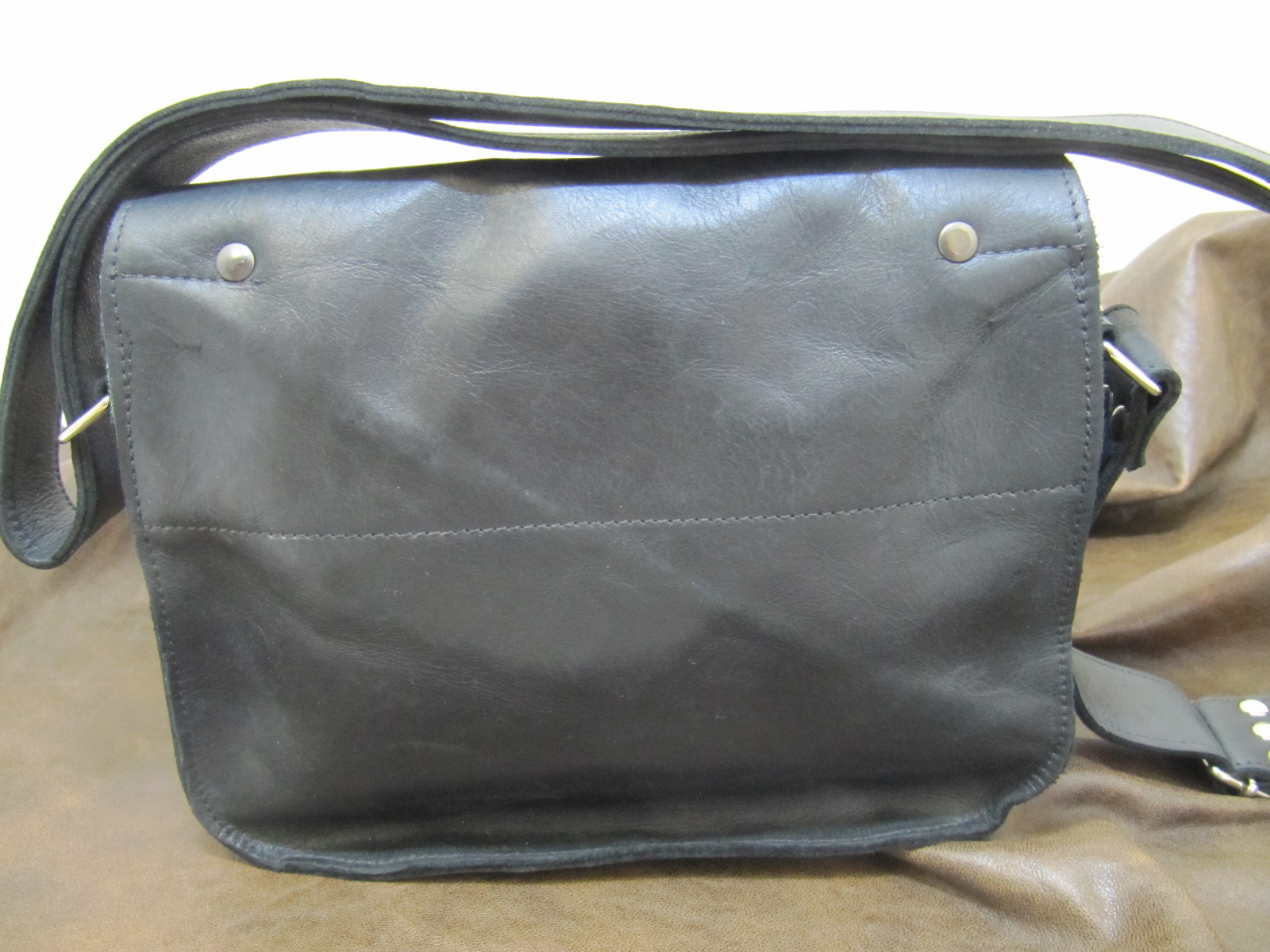 Black leather cartridge style bag