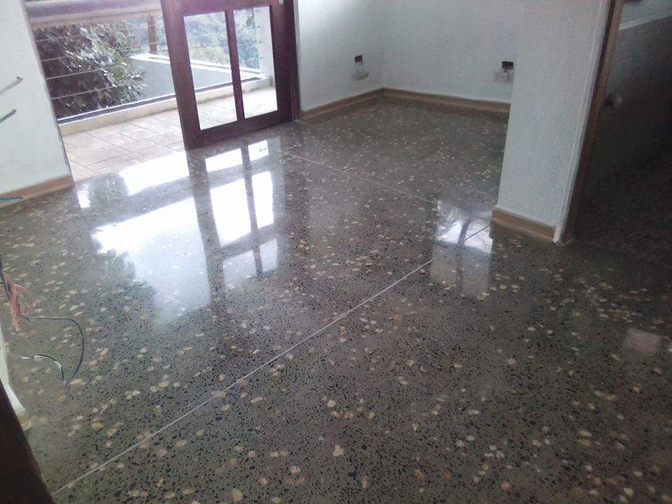 Concrete installation, seeded aggregate and High Gloss Polish