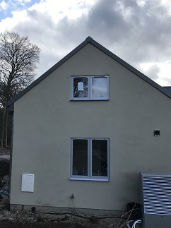 White windows with trickle vents into new project