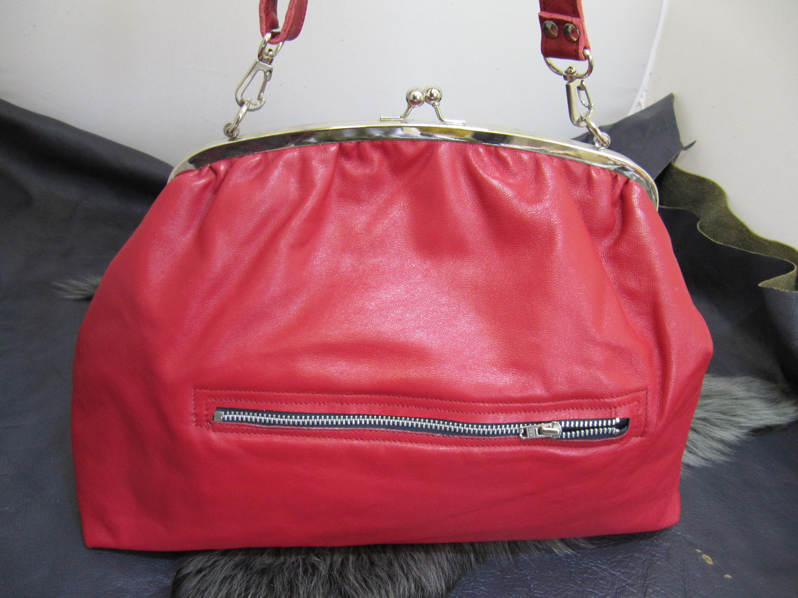 Large red leather clasp top bag