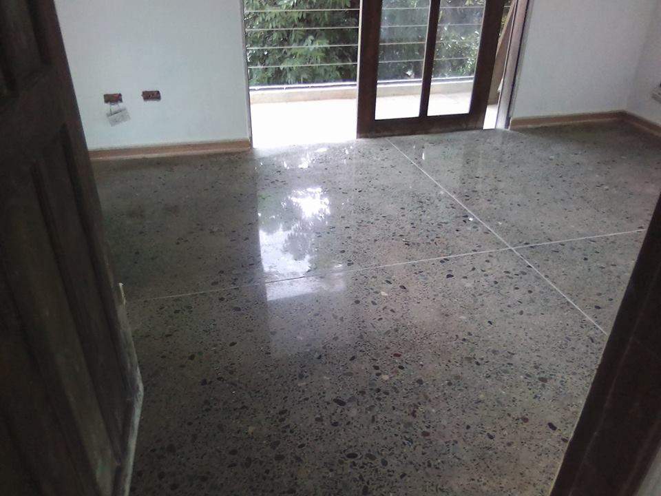 Concrete installation, seeded aggregate and High Gloss Polish