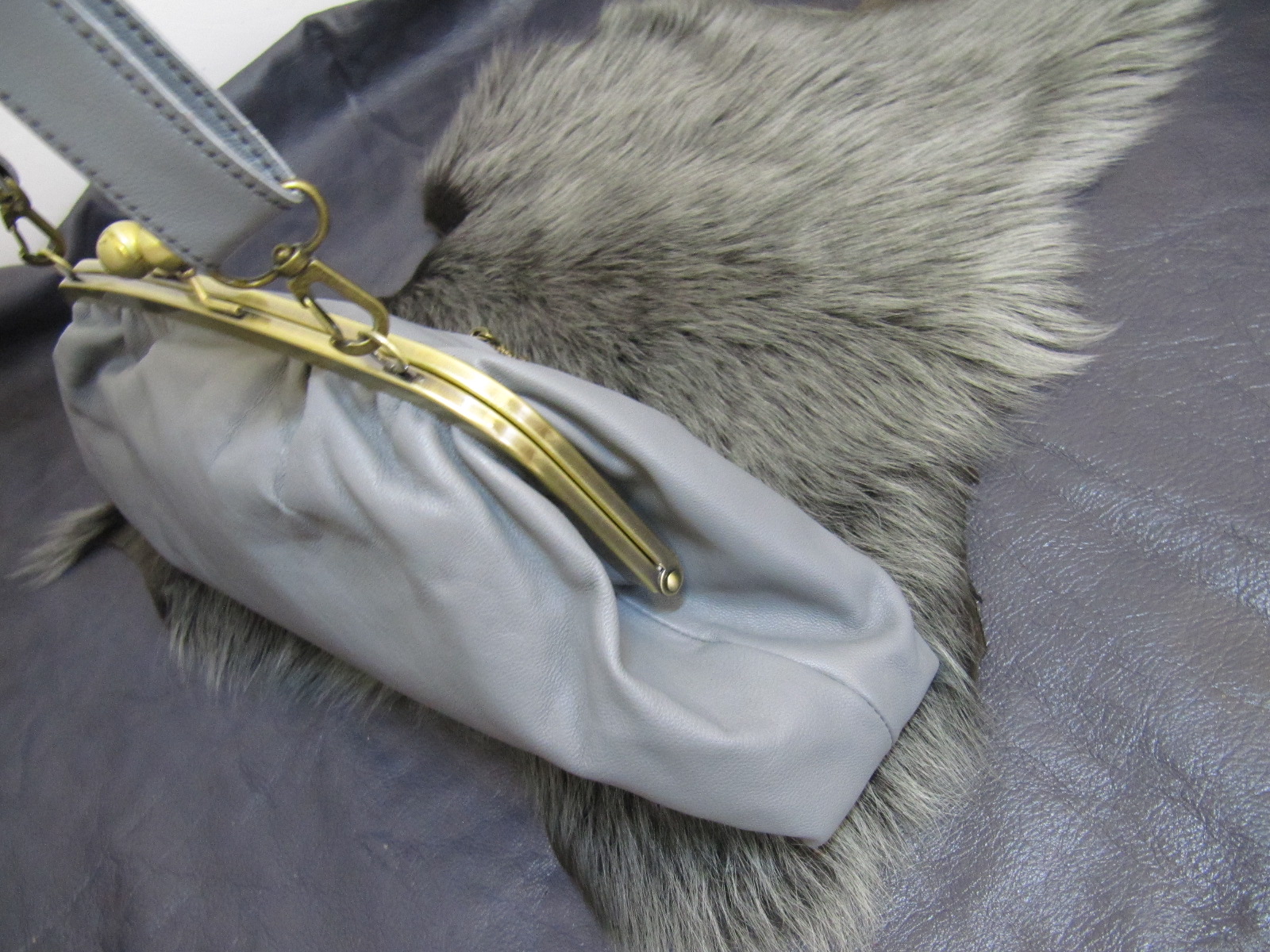 Grey leather & vintage gold clasp top bag