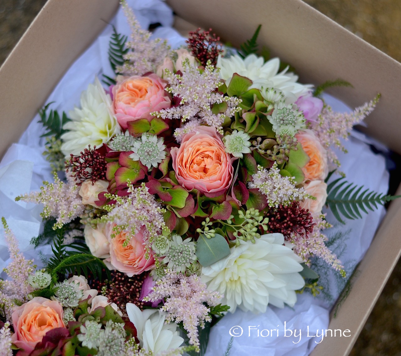 autumnal-bouquet-coral-rose-pink-astilbewhite-dahliaskimmiaferns.jpg