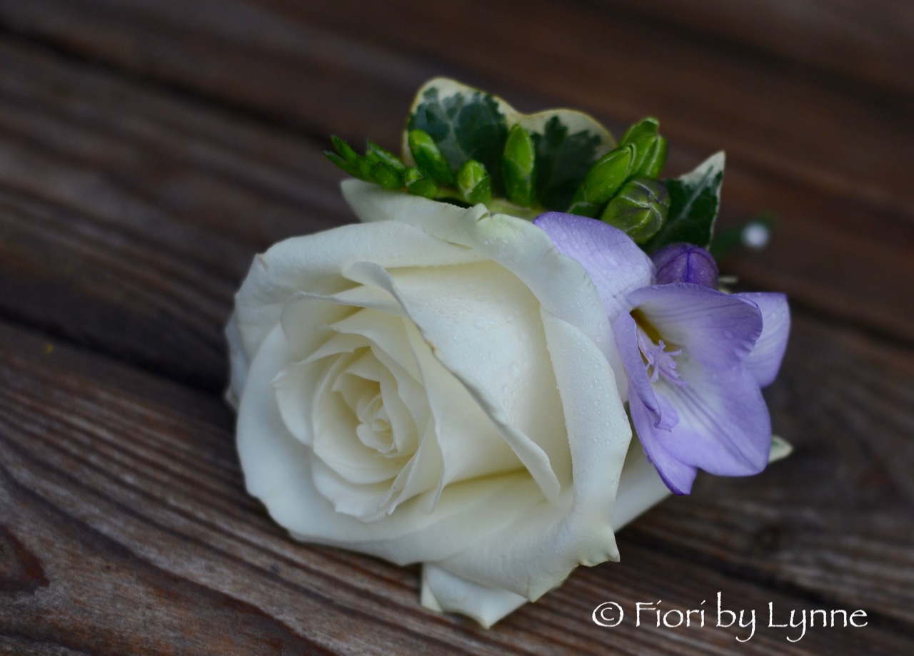 buttonhole-lilac-freesia-white-rose.jpg
