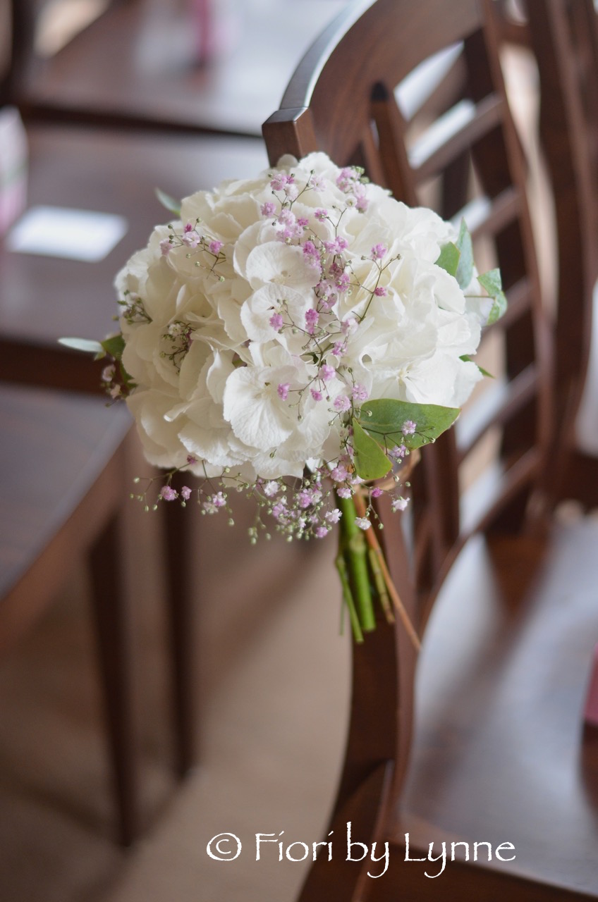 chair-flowers-white-hydrangeapink-gypsophila-houghtonlodge.jpg