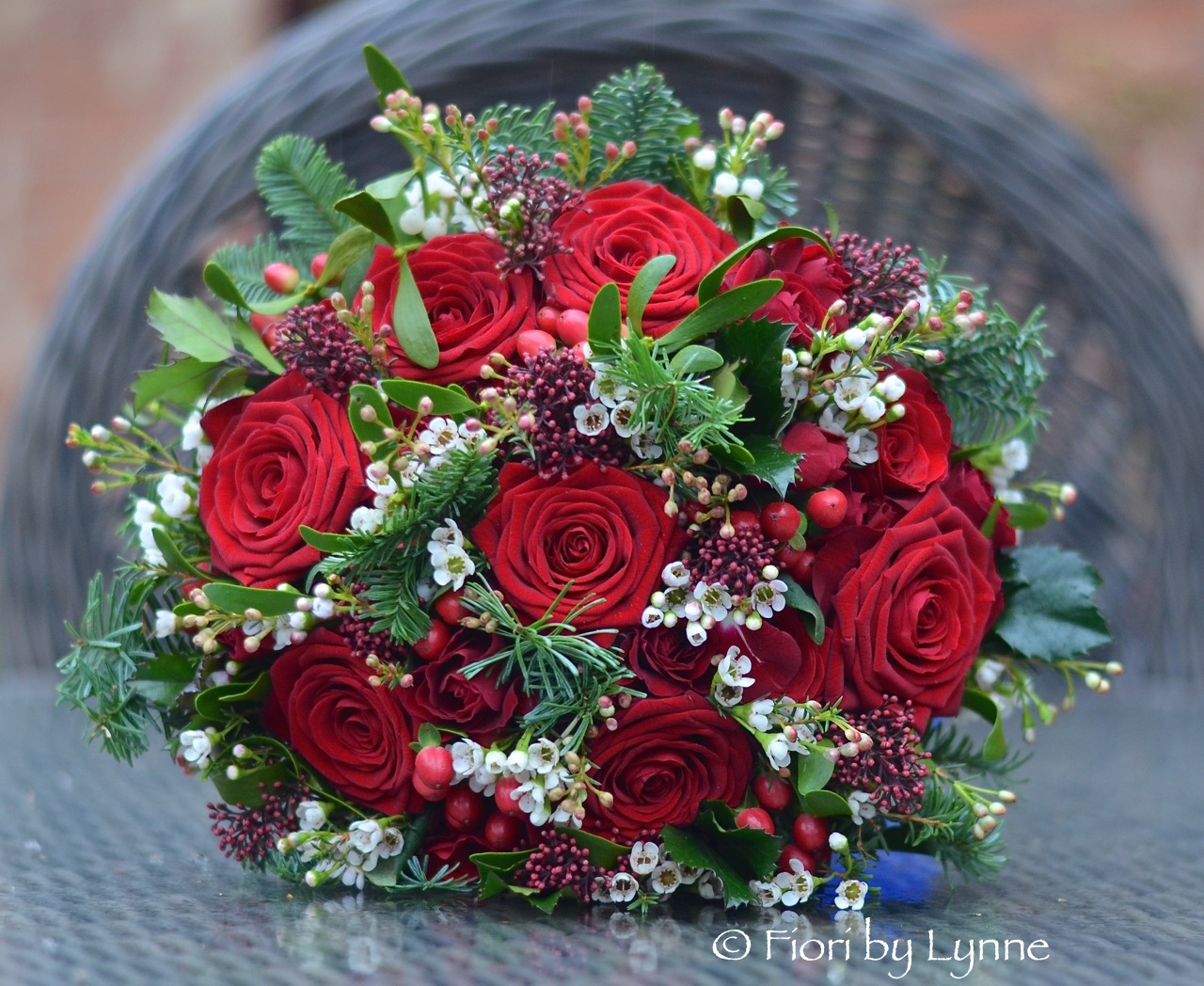 christmas-bouquet-red-rose-berrypine-mistletoe-hollywhite-waxflower.jpg