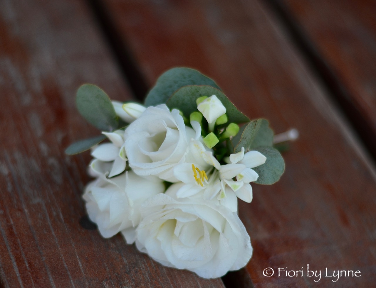 corsage-white-lisianthus-bouvardia-agapanthuseucalyptus.jpg