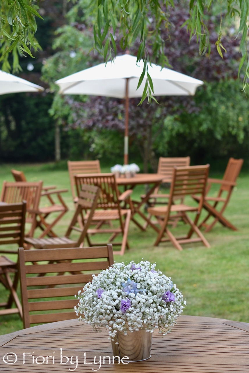 garden-party-wedding-centrepiece-gypsophilablue.delphinium.jpg