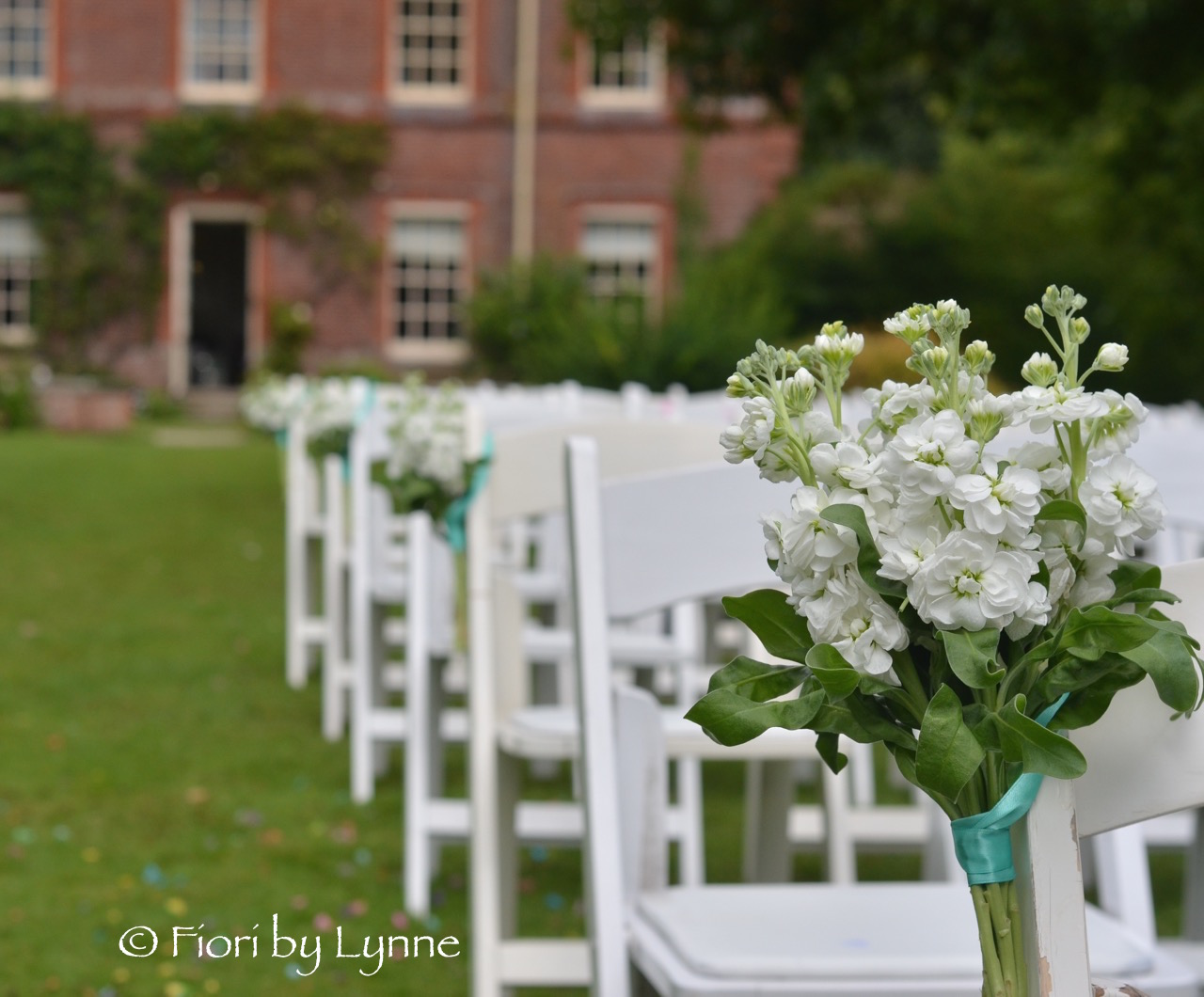 lainston_pavilion-wedding-chair-flowers-tied-bunches-stocks.jpg