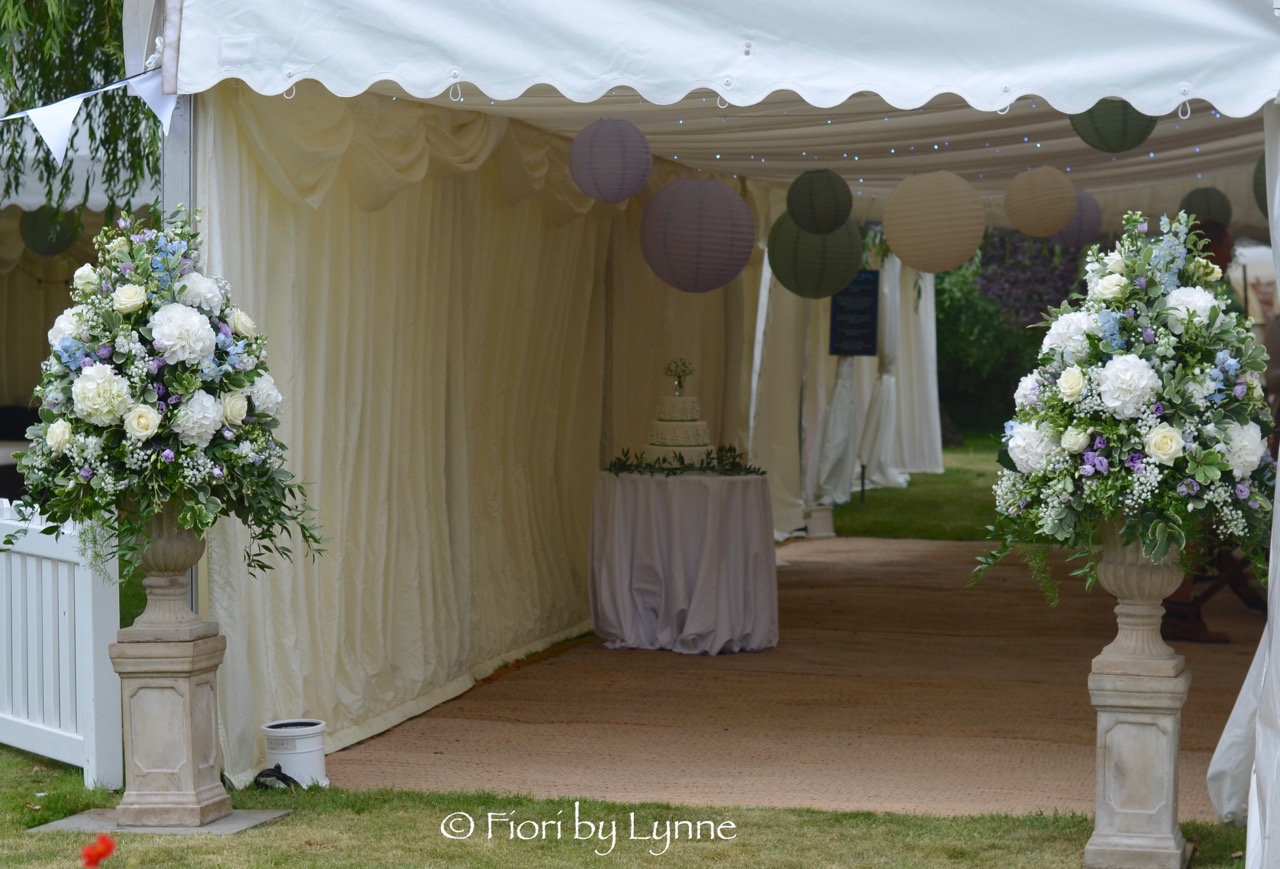 marquee-entrance-wedding.urns.flowers..jpg