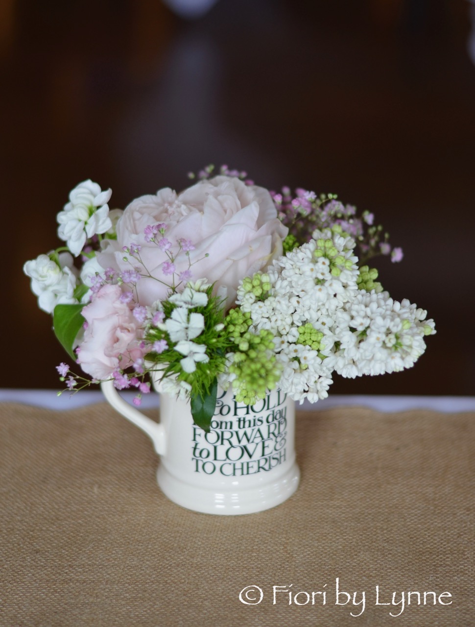 mrmrs-jugs-flowers-for-top-table-shabby-chic-wedding.jpg