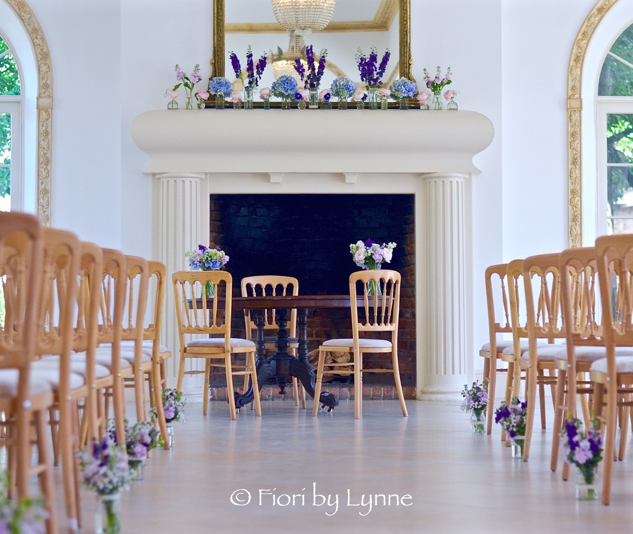 northbrookpark-ceremony-flowers-table-mantle-aisle.jpg