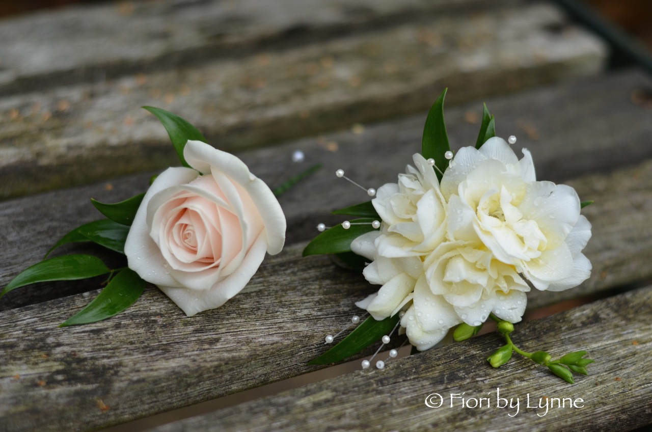 nude-rose-buttonholecorsage-freesia-pearls.jpg