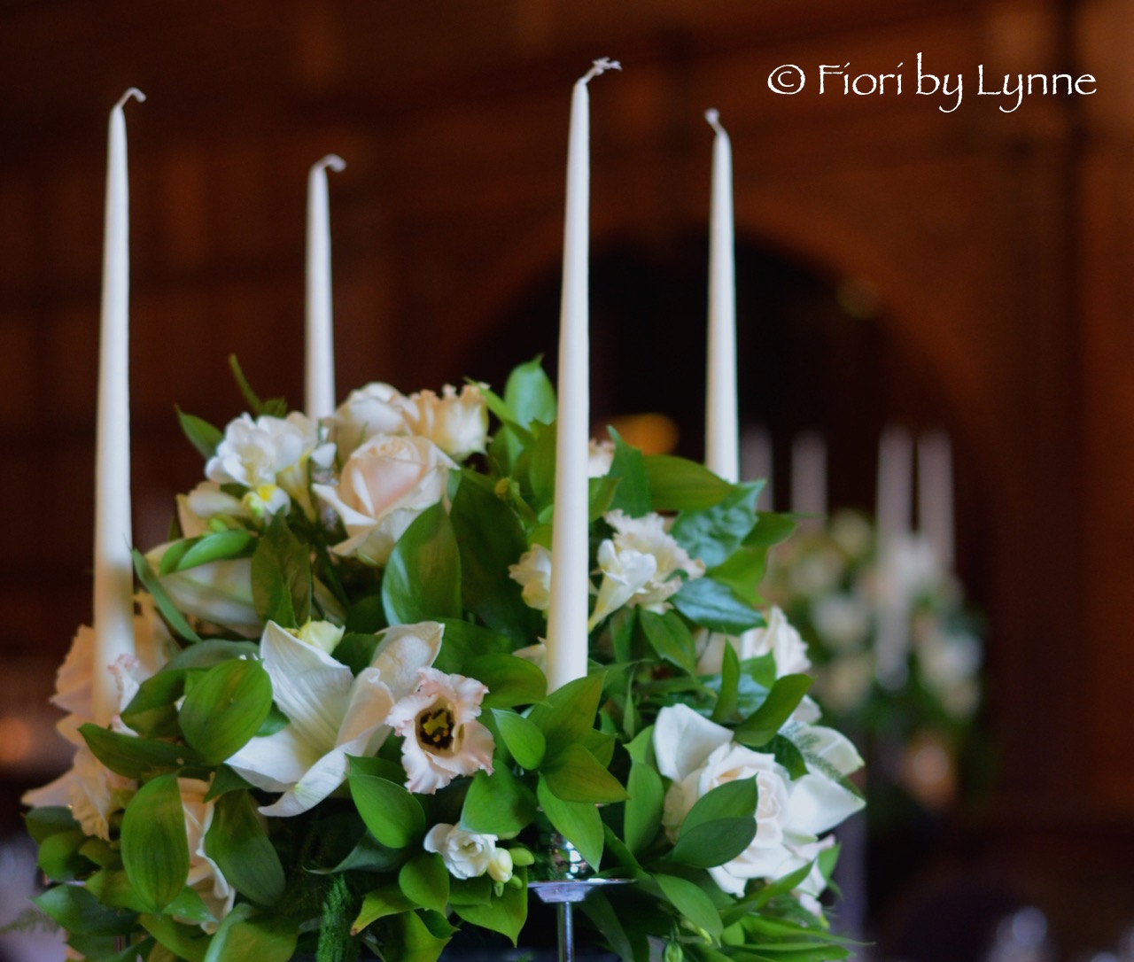 rhinefield-winter-wedding-candelabra-white-amaryllisnude-roselisianthus.jpg