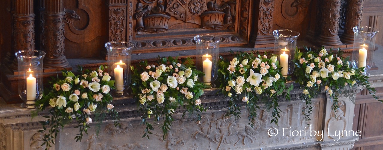 rhinefield-winter-wedding-mantle-flowers-whitesgoldscandleslanterns.jpg