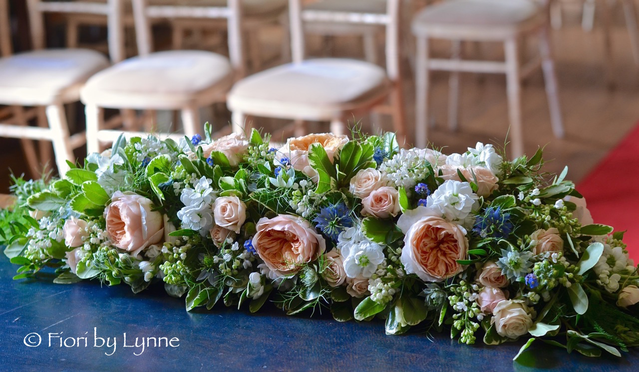 rownhamshouse-ceremony-table-flowers.jpg