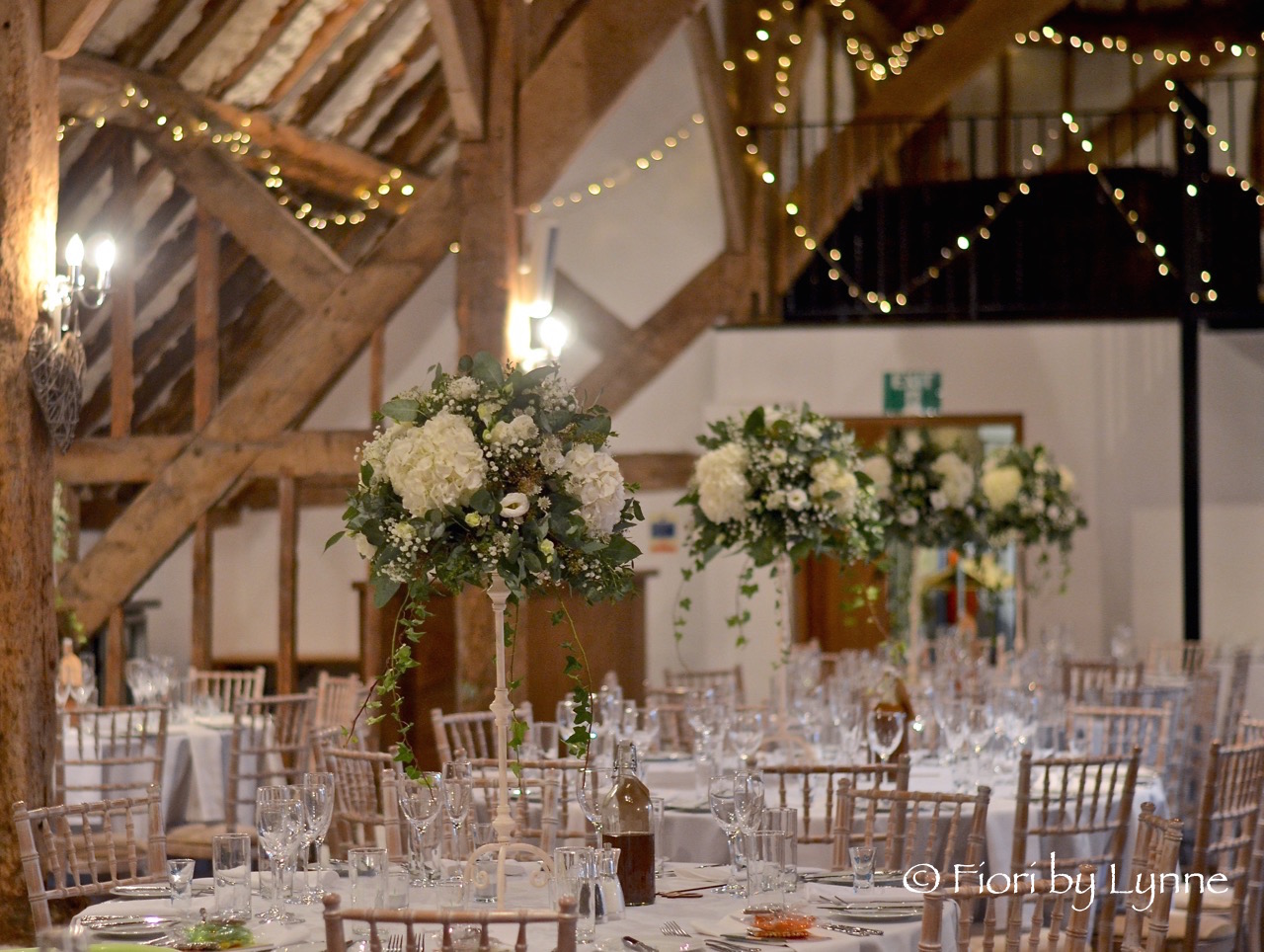 rustic-barn-wedding-tall-centrepieces-whitessilver-fitzleroi.jpg