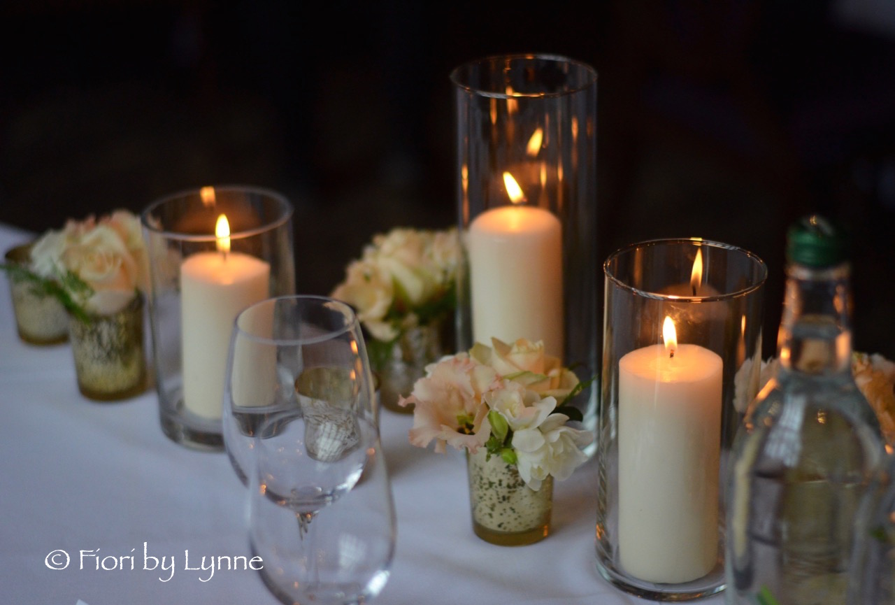 top-table-design-mixed-candlesflowers-whitesandgolds.jpg