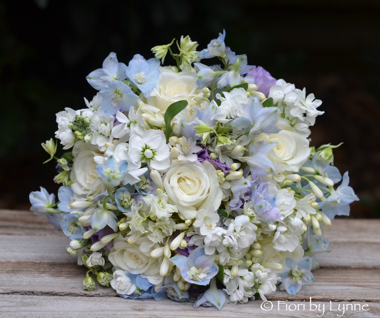 whitebluelavenderbouquetsummerweddingrosedelphiniumstocklarkspurandlisianthus1.jpg