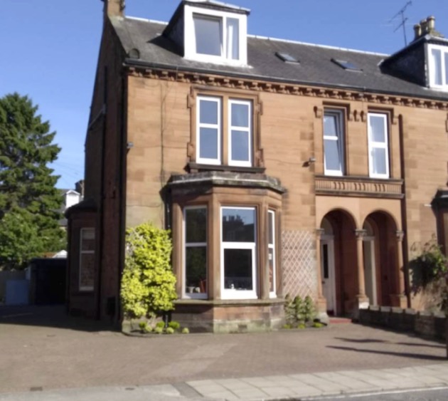 External view of Lindean Guest House Dumfries, a Victorian red sandstone villa in a quiet residential street near the railway station. We offer plenty free parking and are biker friendly.